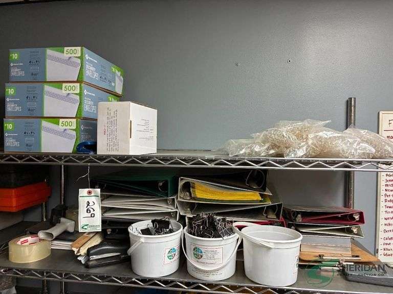 Contents of top 2 shelves office supplies image
