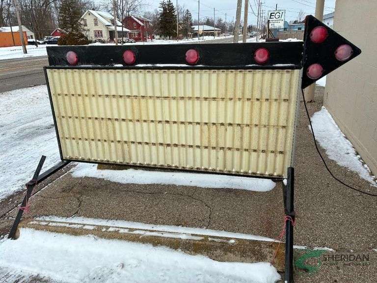 Arrow sign with letters and numbers image