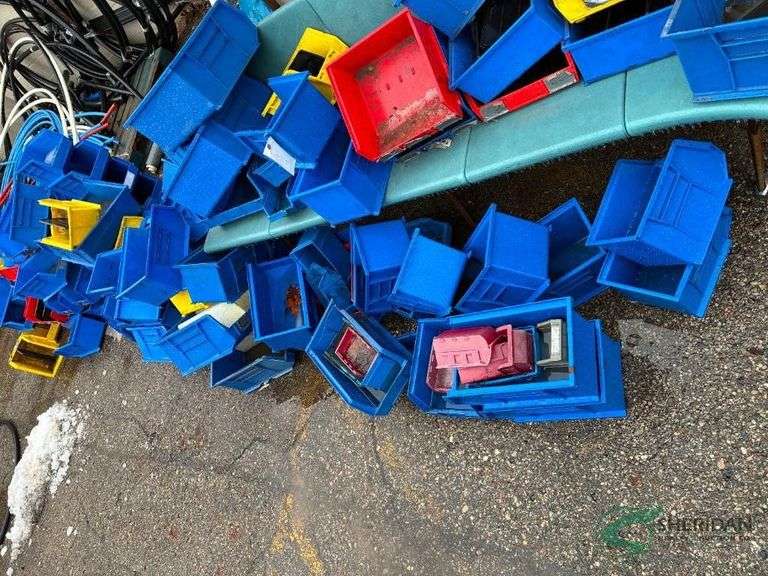 Numerous bins that came out of the vans image