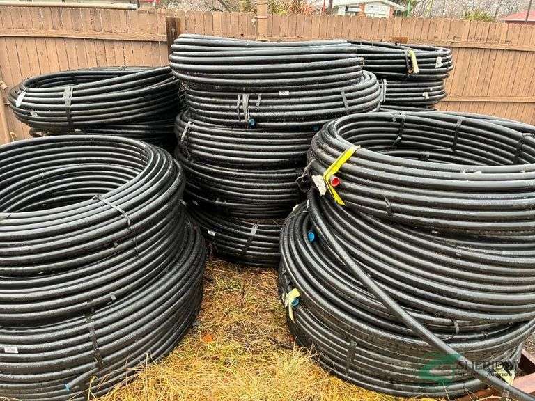 Numerous rolls of new 1.25" irrigation pipe image