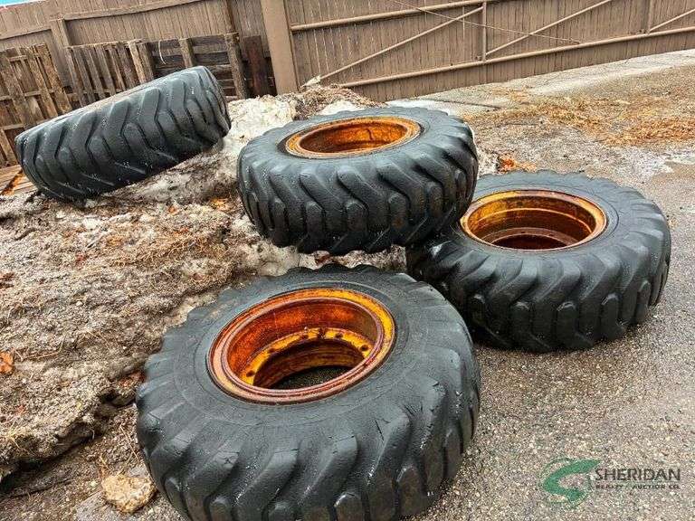 4 17.5-25 tires on rims image