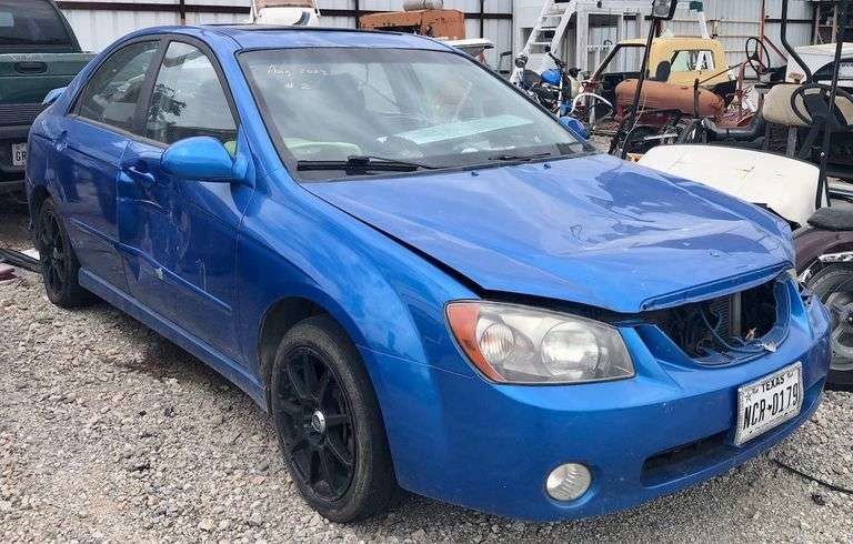 2005 Kia Spectra - arrest, I have the key, starts, runs/drives, a/c works, 182k miles showing, storage lien