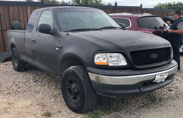 1998 Ford F-150 - rebuilt salvage * good title * i have the key * runs and drives * a/c works, windows don't * 'special edition' truck