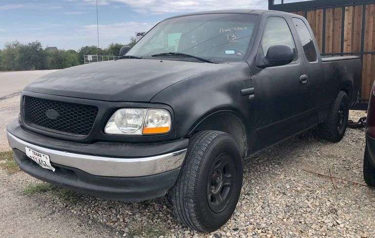 1998 Ford F-150 - rebuilt salvage * good title * i have the key * runs and drives * a/c works, windows don't * 'special edition' truck