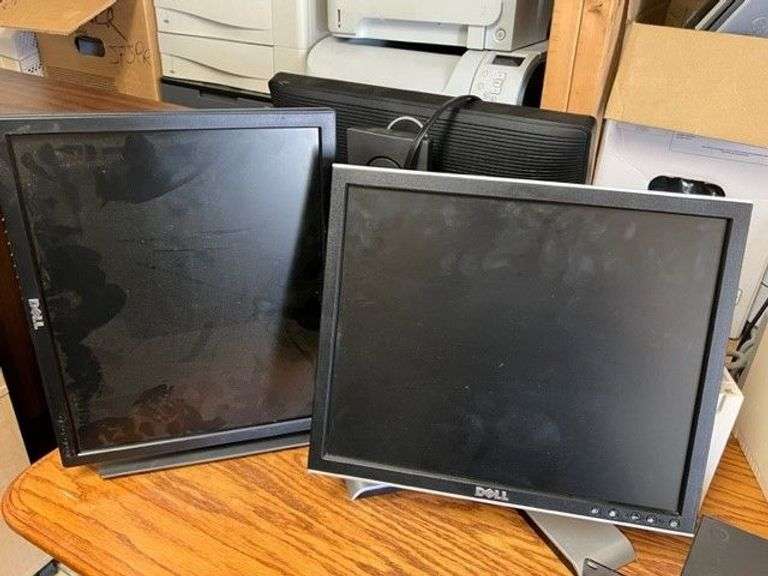 Desk, Computer Bag, Ink Cartridges, Box of Misc. Cords, Netgear Pro Safe JGS524pe 24-Port Switch, 2 APC Battery Backups, 3 Monitors, TV Tray, Milk Crate Full of Electronic Items, Trash Can with Misc. Items, Box of Hanging Folders, Working Condition Unknown