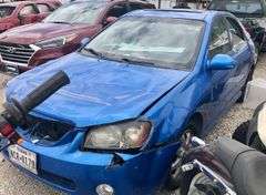 2005 Kia Spectra - arrest, I have the key, starts, runs/drives, a/c works, 182k miles showing, storage lien