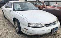 1995 Chevy Monte Carlo - abandoned on private property * no key * storage lien