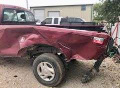 2002 Toyota Tundra - broke down on the side of the road, then a semi hit it * i had a key made, the motor fired up, sounds good. * The transmission is making a noise when shifted out of park * storage lien