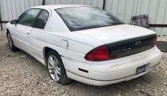 1995 Chevy Monte Carlo - abandoned on private property * no key * storage lien