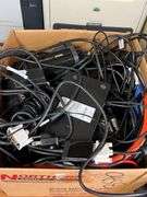 Desk, Computer Bag, Ink Cartridges, Box of Misc. Cords, Netgear Pro Safe JGS524pe 24-Port Switch, 2 APC Battery Backups, 3 Monitors, TV Tray, Milk Crate Full of Electronic Items, Trash Can with Misc. Items, Box of Hanging Folders, Working Condition Unknown