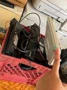 Desk, Computer Bag, Ink Cartridges, Box of Misc. Cords, Netgear Pro Safe JGS524pe 24-Port Switch, 2 APC Battery Backups, 3 Monitors, TV Tray, Milk Crate Full of Electronic Items, Trash Can with Misc. Items, Box of Hanging Folders, Working Condition Unknown