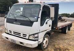 2006 Isuzu NPR - good blue title * transmission bolts fell out, transmission twisted and broke the case & also messed up the motor * Has the 6.0L gas motor from Chevy