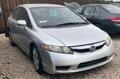 2009 Honda Civic - rebuilt salvage * has key * check engine light on * runs/drives * good blue title