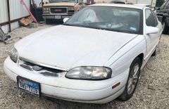 1995 Chevy Monte Carlo - abandoned on private property * no key * storage lien