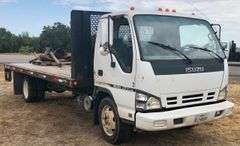 2006 Isuzu NPR - good blue title * transmission bolts fell out, transmission twisted and broke the case & also messed up the motor * Has the 6.0L gas motor from Chevy