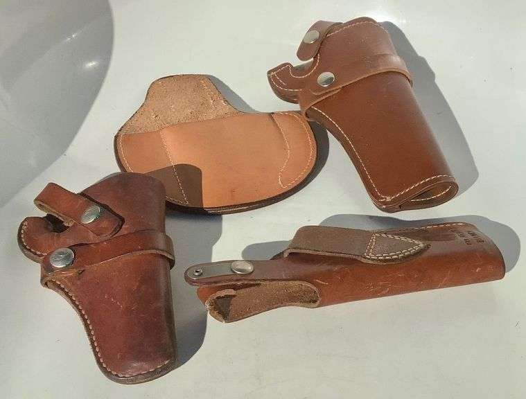 4 Brown Leather Pistol Holsters image