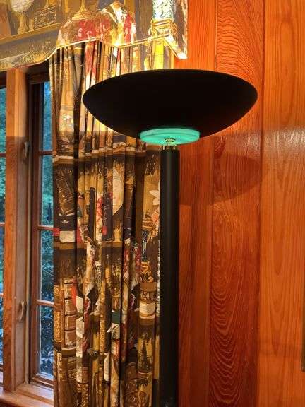 Flat screen TV, tall lamp and side table
