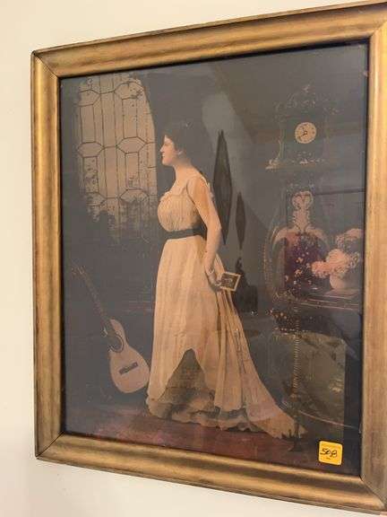 Framed Print of a Woman by the Window with Guitar image
