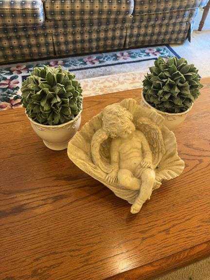 Angel Statue and Two Decorative Green Potted Plants image