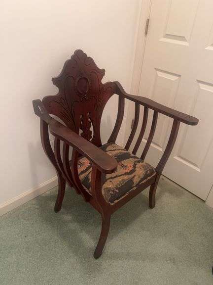 Ornate Carved Armchair with Golf Motif Cushion image