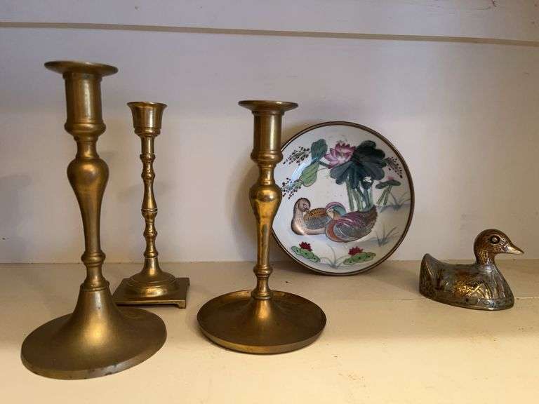 Brass Candlestick Holders, Decorative Plate, and Duck Figurine Collection image