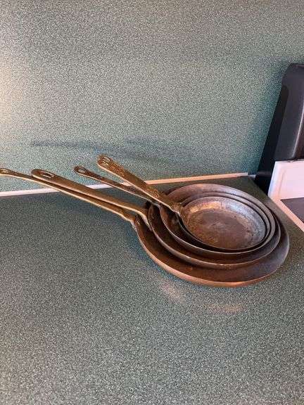 Set of Five Metal Frying Pans with Brass Handles image