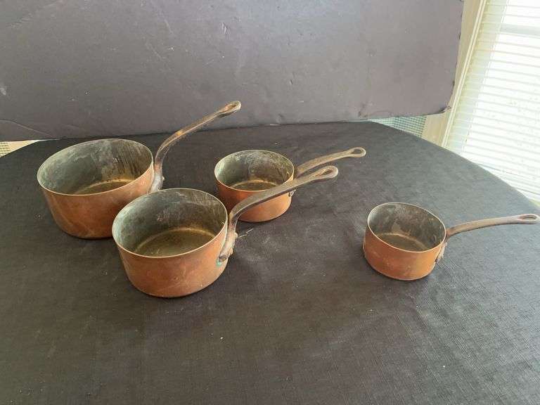 Set of Four Copper Sauce Pans with Handles image