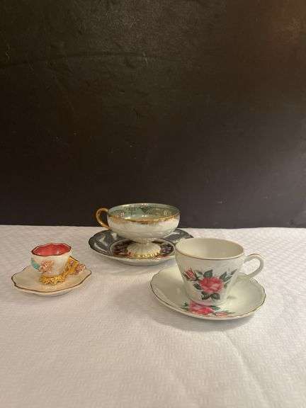 Collection of Three Decorative Cups and Saucers image