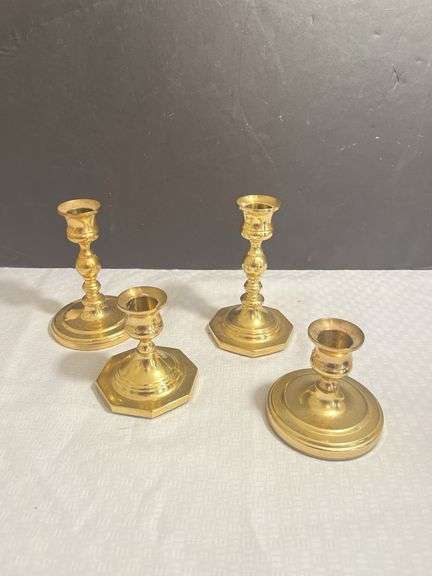 Set of Four Brass Candlestick Holders image