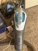 Handheld Vacuum and Bissell Spot Cleaner