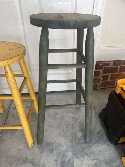 Three wooden barstools