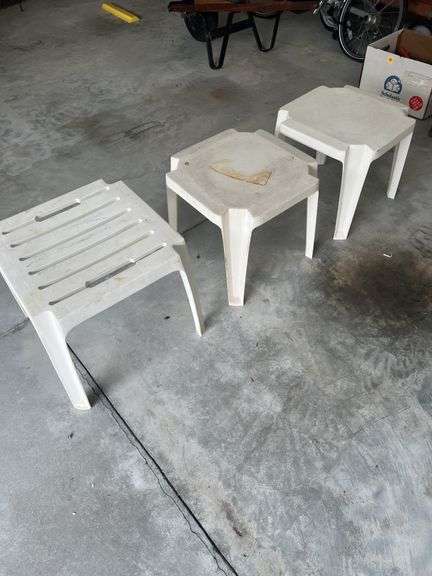 Three plastic end tables