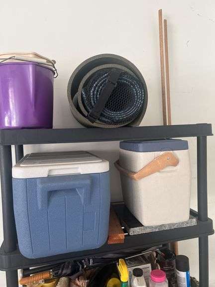 Plastic shelving unit with contents