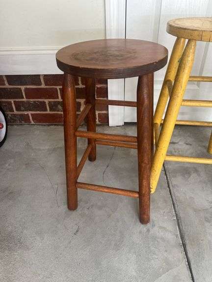 Three wooden barstools