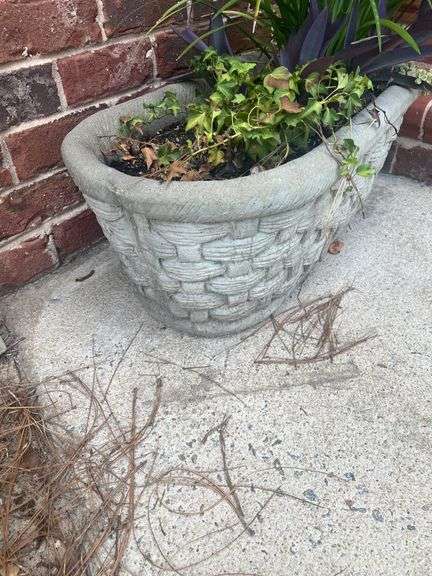 Oval concrete planter with basket pattern