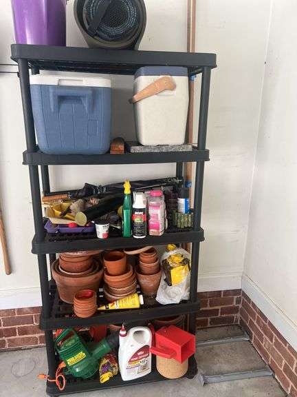 Plastic shelving unit with contents