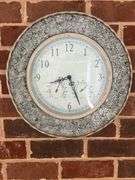 Wall clock on porch