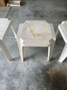 Three plastic end tables