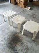 Three plastic end tables