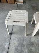Three plastic end tables