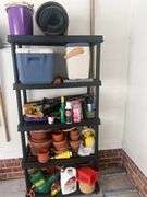 Plastic shelving unit with contents