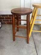 Three wooden barstools