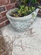 Oval concrete planter with basket pattern