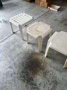 Three plastic end tables