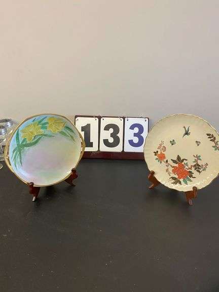TWO PLATES ON STANDS image
