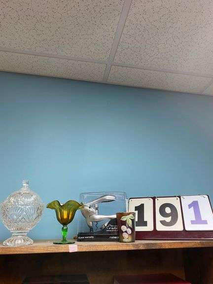 TOP SHELF OF BOOK CASE image