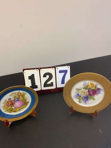 TWO PLATES ON STANDS image