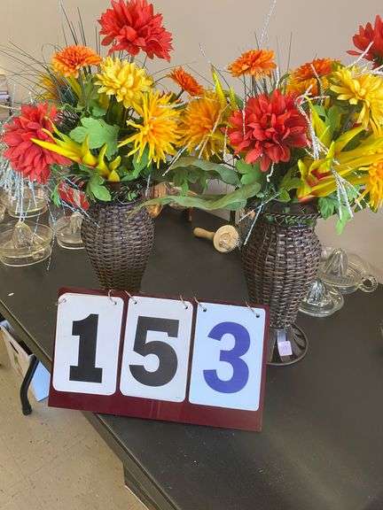 TWO FLORAL PIECES AND METAL VASES image