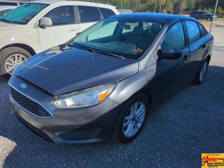 2018 Ford Focus SE; 111,973 Miles; VIN 1FADP3F20JL252781