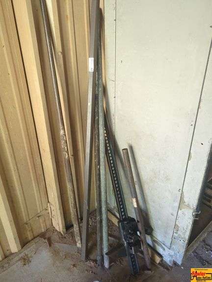 Assorted Metal Pipes, Bars, and a Ratcheting Jack